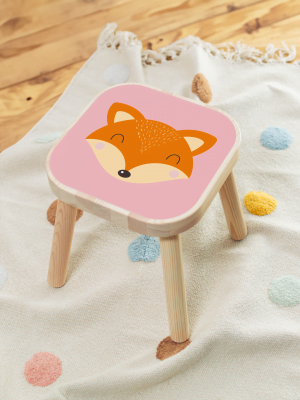 Flisat-barnpall med klistermärken som har en rosa bakgrund med en räv